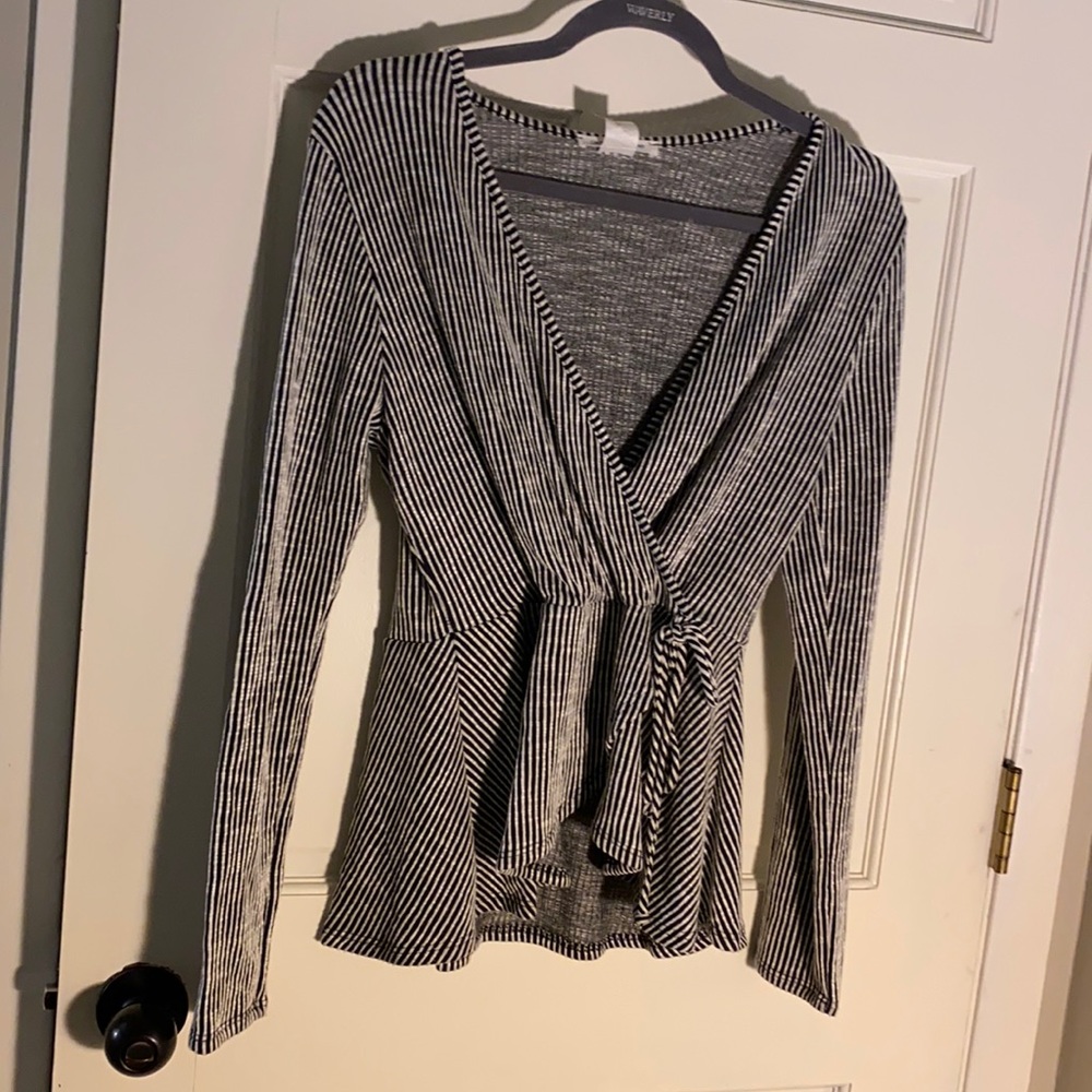 Peplum faux wrap striped shirt